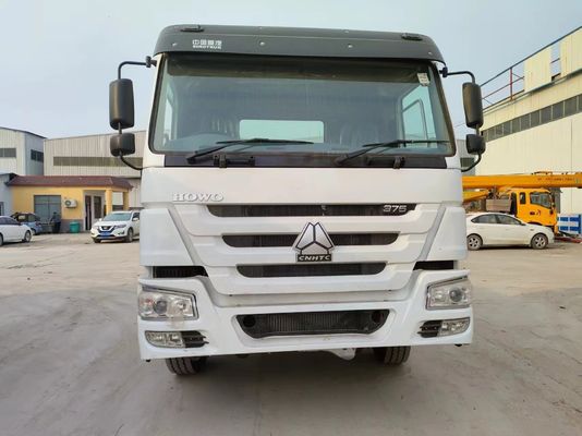 Camion à traction à droite Sinotruk 6*4 Blanc Couleur 6800*2496*2950mm Sièges ≤5
