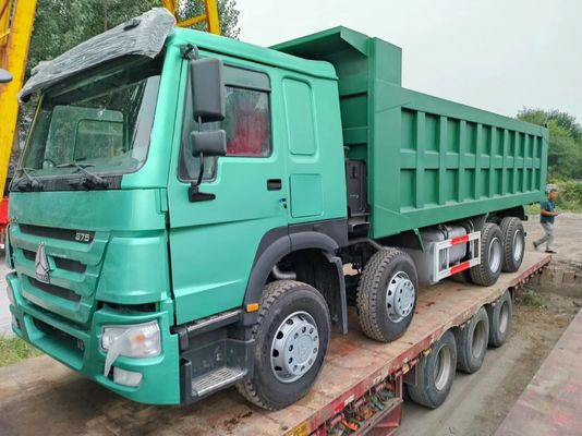 12 pneumatiques Sinotruk HOWO 8*4 camion de décharge camion d'occasion vert avec boîte manuelle