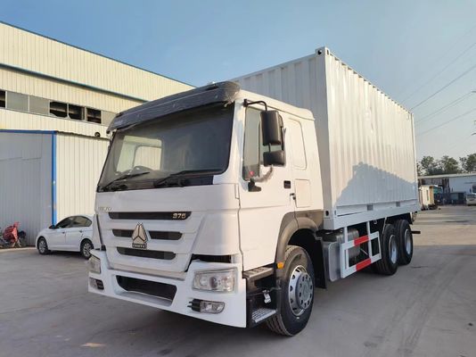 6*4 Design de pneus radiaux Sinotruck HOWO Blanc camion d'occasion 10 pneus pour roue motrice