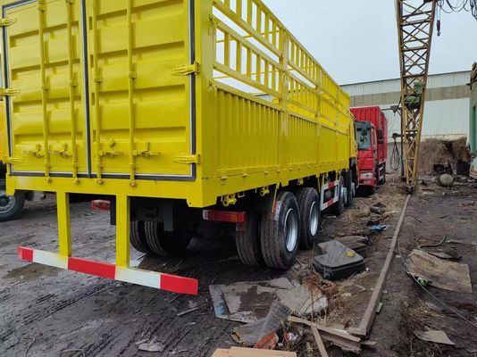 Camion à rouleaux de couleur jaune HOWO 6*4 Box Truck Camion d'occasion avec certification ISO